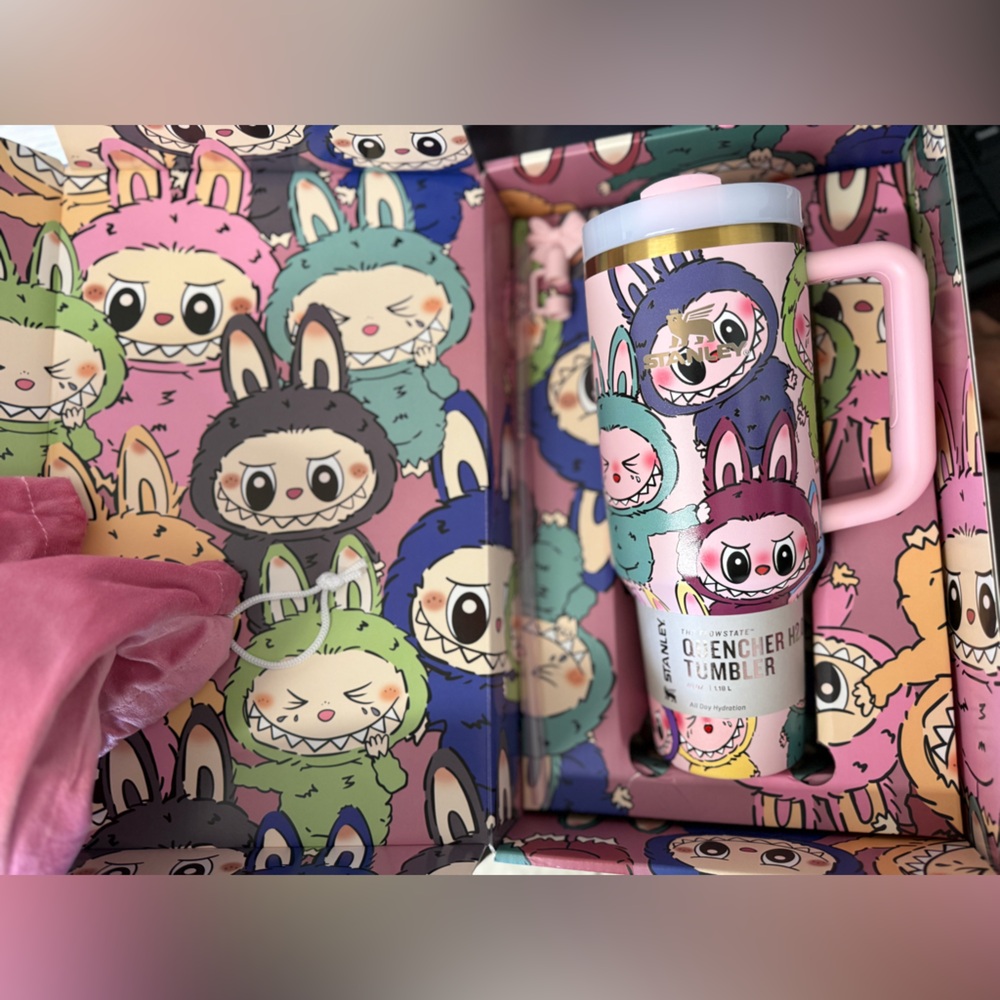 Stanley Pink and Multicolor Character Tumbler